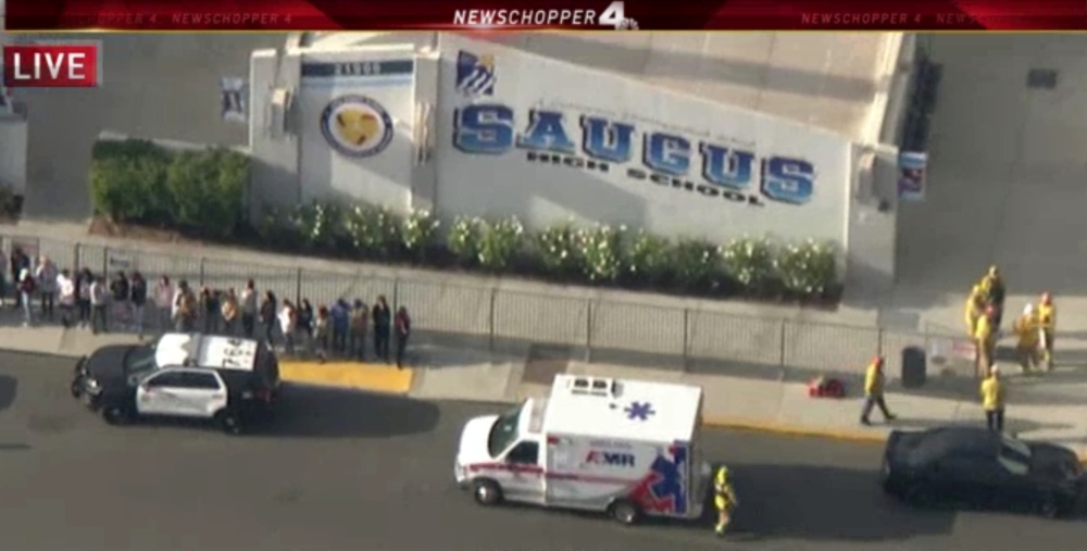 Police and emergency vehicles on the scene of a shooting at Saugus high school in Santa Clarita, California, U.S., November 14, 2019 in this screenshot taken from video footage courtesy of NBCLA. (NBCLA via REUTERS)