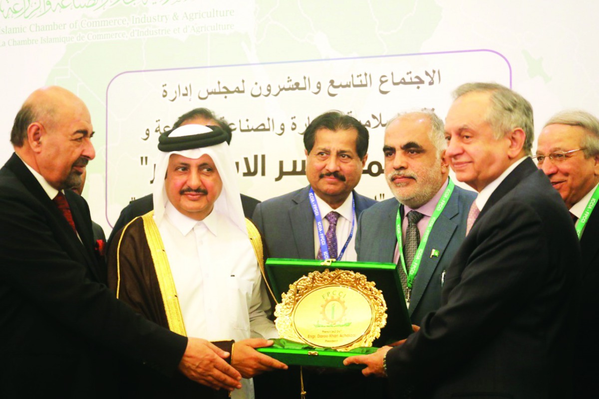 Qatar Chamber Chairman and First Vice-Chairman of the Islamic Chamber of Commerce, Industry & Agriculture (ICCIA), Sheikh Khalifa bin Jassim Al Thani (second left), and other officials during the event.