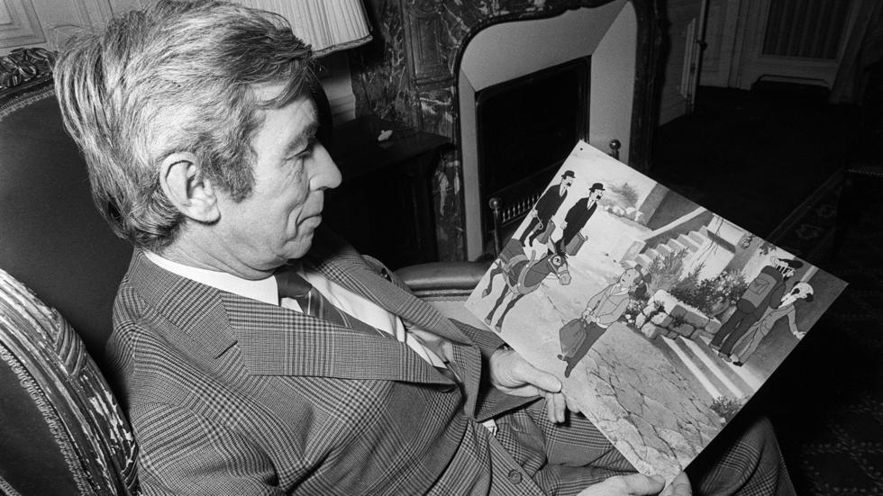 Comics author Georges Remi, also known as Hergé, reading his book “Tintin and the Lake of Sharks” on December 7, 1972. AFP 