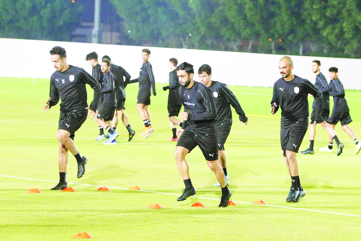 Al Sadd’s players take part in a training session yesterday. 