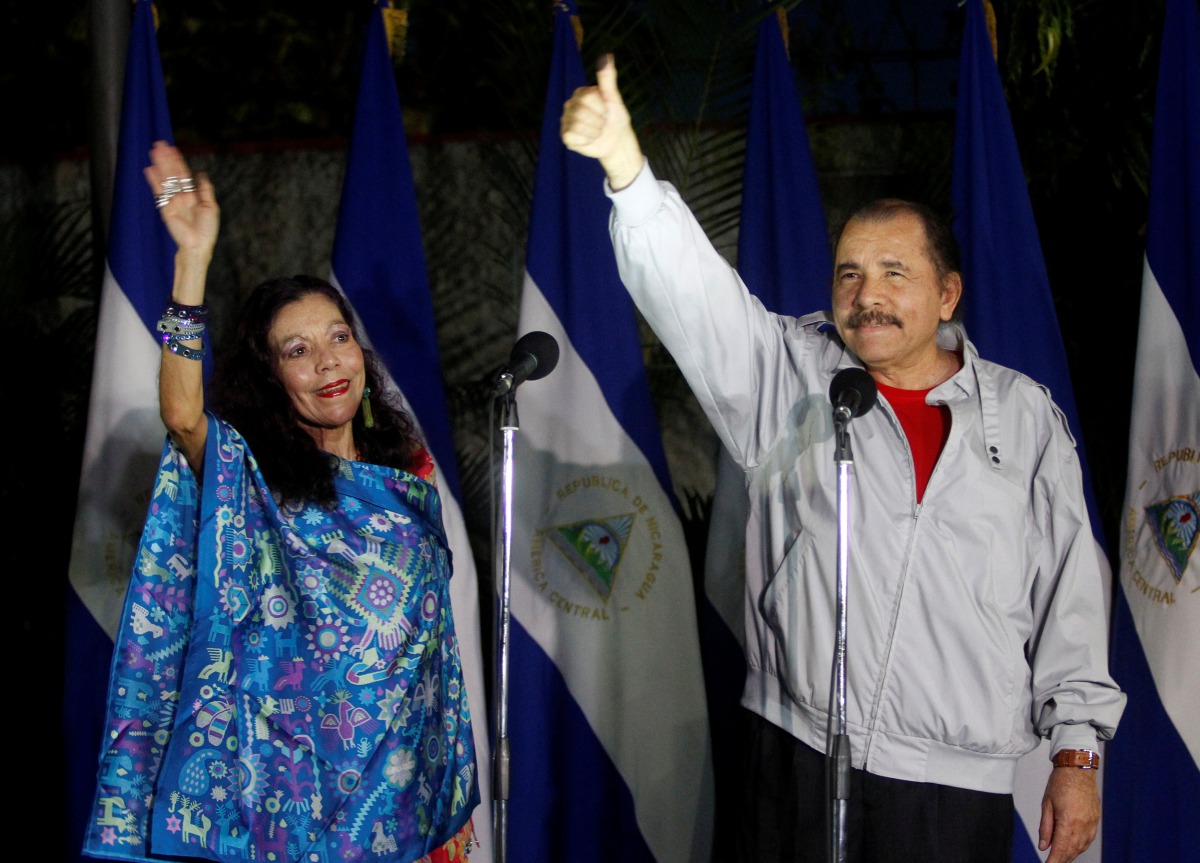 Nicaragua president Daniel Ortegashows his ink stained thumb to the media beside his wife Rosario Murillo after they casting their vote in Managua November 6, 2016. Reuters / Oswaldo Rivas