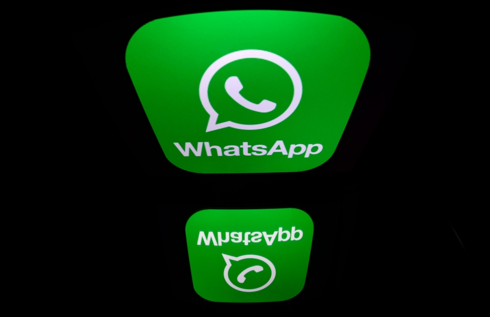 The logo of WhatsApp mobile messaging service in a file photo taken on December 28, 2016 in Paris. AFP / Lionel Bonaventure