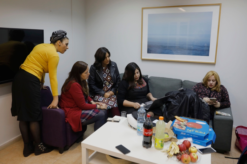 A picture taken on November 18, 2019, shows Israeli activists (L to R) Hila Hassan Lefkowitz, Esther Twersky, Yael Elimelech, Esti Shushan, and Rachel Morgerstern of the Nivcharot foundation, an Ultra-Orthodox feminist group, during a work meeting in the 