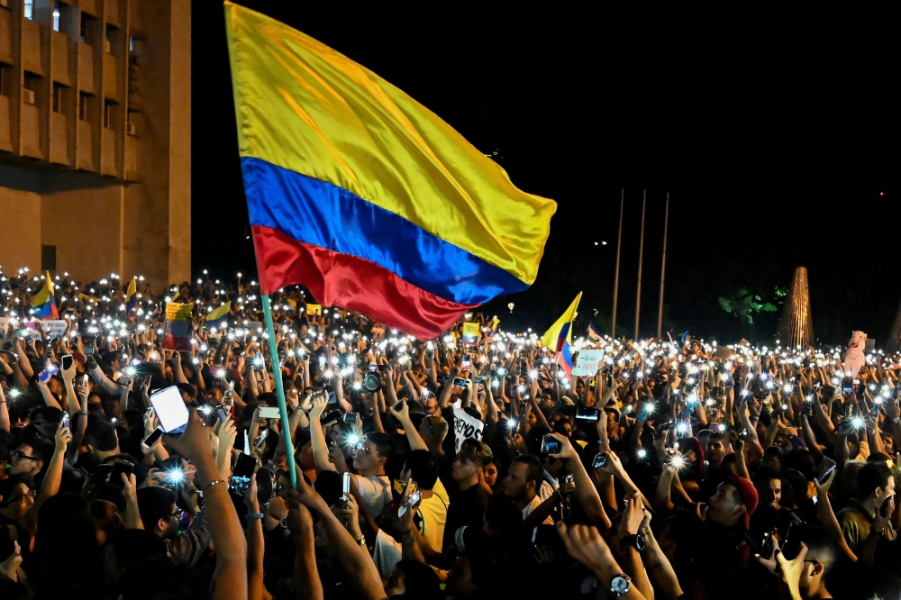 People take part in a protest against the government of Colombia's President Ivan Duque, in Cali, Colombia on November 23, 2019. AFP / Luis Robayo
 