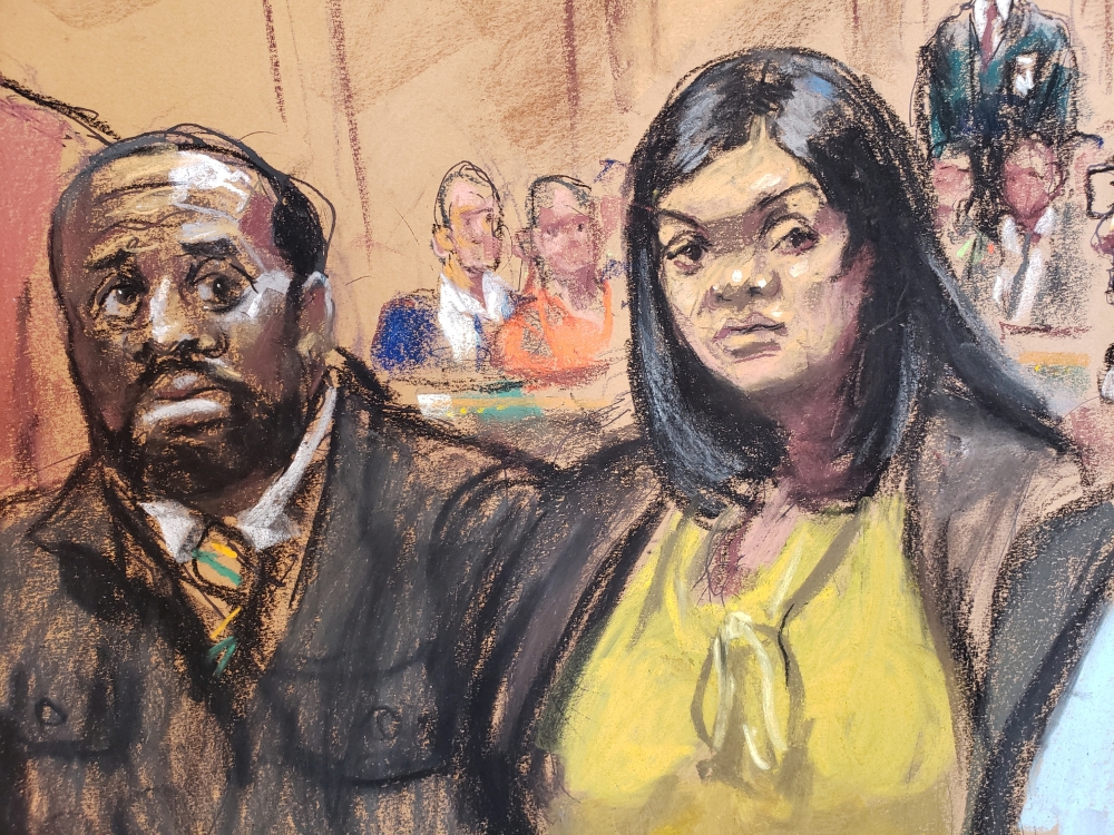 Michael Thomas and Tova Noel appear on charges they falsely certified to having conducted inmate counts during the final hours of Jeffrey Epstein at the Federal Court in New York, November 25, 2019 in this courtroom sketch. Reuters/Jane Rosenberg
 