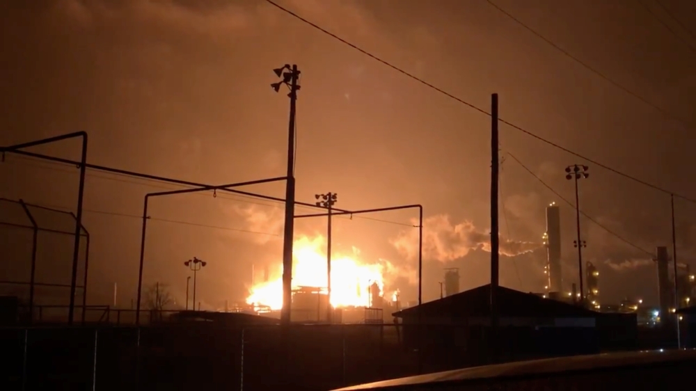 An explosion and fire are pictured at a chemical plant in Port Neches, Texas, U.S., in this picture grab obtained from social media video, November 27, 2019. Casey Porter via REUTERS 