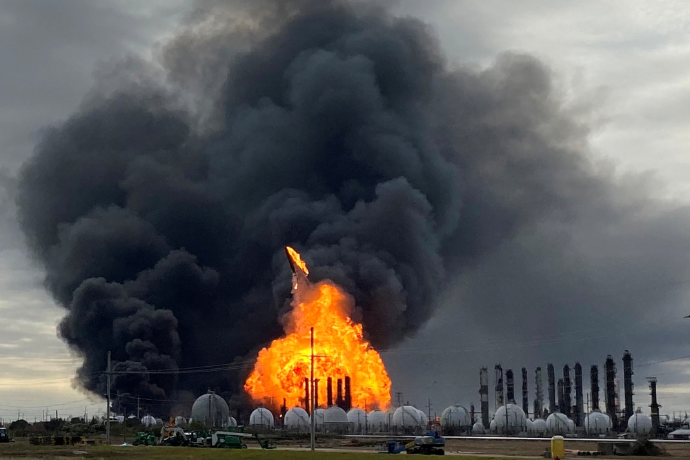 A process tower flies through air after exploding at the TPC Group Petrochemical Plant, after an earlier massive explosion sparked a blazeÊat the plant in Port Neches,ÊTexas, U.S., November 27, 2019.Ê REUTERS/Erwin Seba