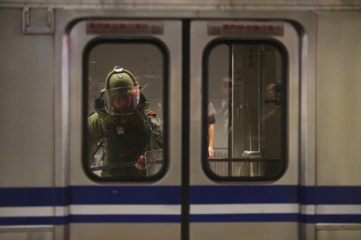 Representative image (A bomb squad officer in protective gear is seen entering the inside of a train carriage that was involved in a blast in Taipei on July 8, 2016. AFP