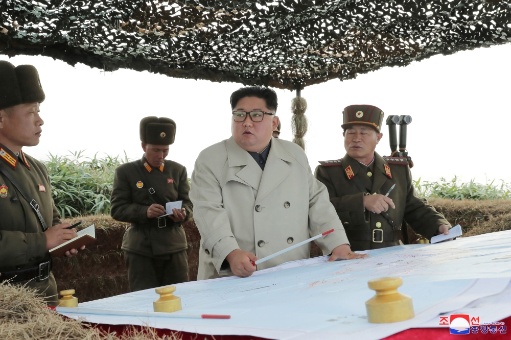 North Korean leader Kim Jong Un visits the Changrindo defensive position on the west front, in this undated picture released by North Korea's Central News Agency on November 25, 2019, via Reuters 
