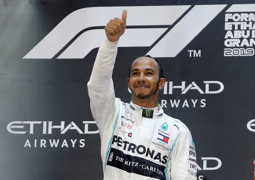 Mercedes' Lewis Hamilton celebrates after winning the race REUTERS/Hamad I Mohammed