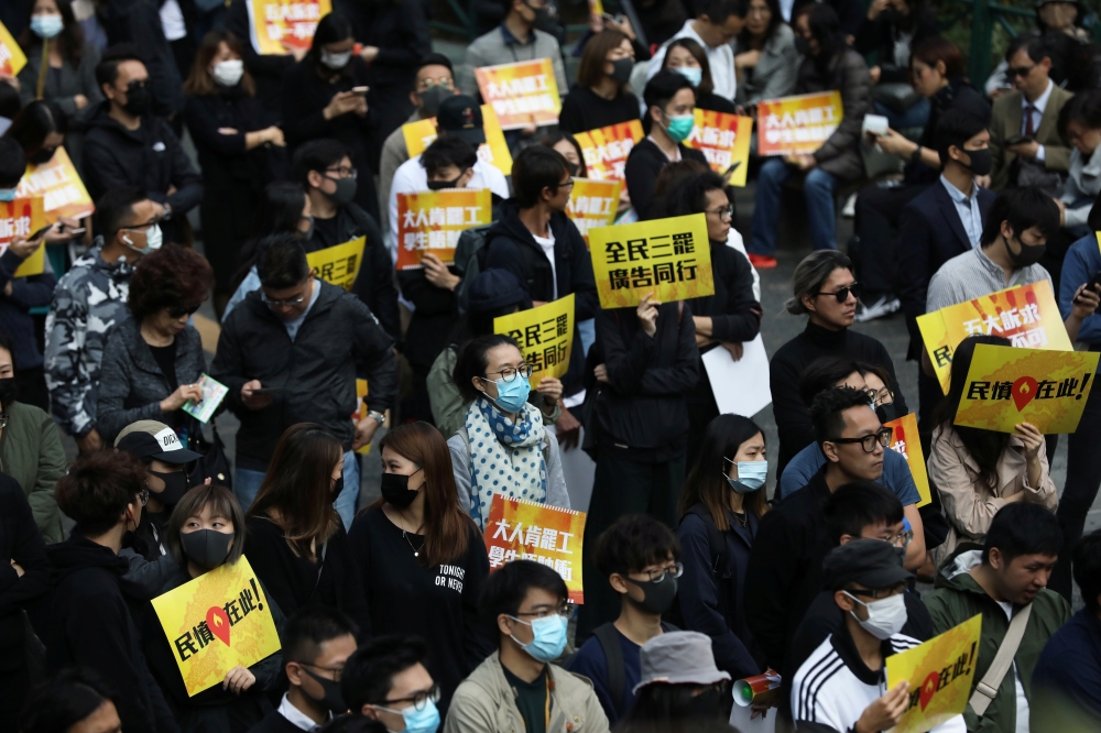 Anti-government demonstrators gather for a lunchtime protest at Chater Garden in Hong Kong, China, December 2, 2019. REUTERS/Leah Millis