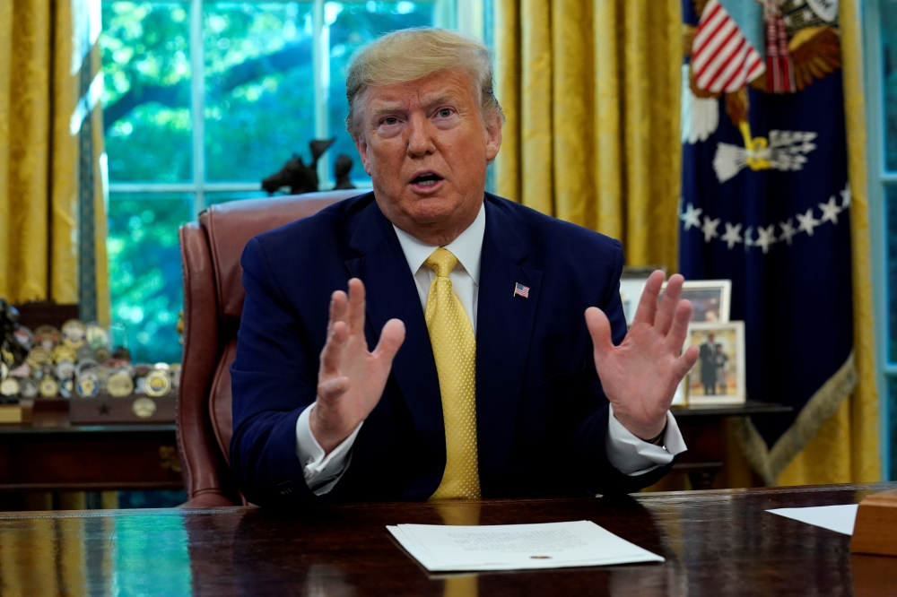 File photo: US President Donald Trump speaks during a meeting with China's Vice Premier Liu He in the Oval Office at the White House after two days of trade negotiations in Washington, U.S., October 11, 2019. Reuters/Yuri Gripas/File Photo