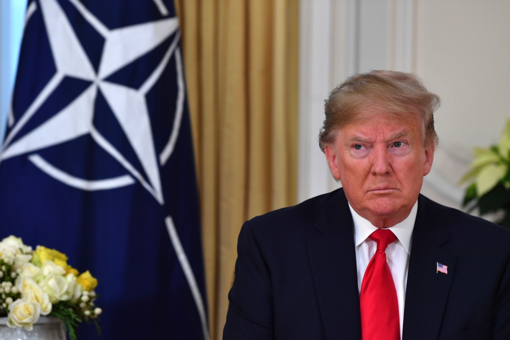 US President Donald Trump speaks during his meeting with Nato Secretary-General Jens Stoltenberg at Winfield House, London on December 3, 2019. AFP / Nicholas Kamm