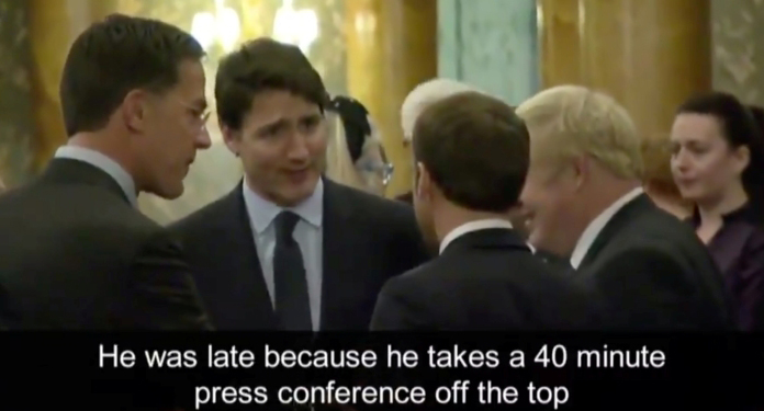 Canadian Prime Minister Justin Trudeau speaks with French President Emmanuel Macron, British Prime Minister Boris Johnson and Dutch Prime Minister Mark Rutte ahead of the NATO summit, at a reception at Buckingham Palace in London, Britain December 3, 2019