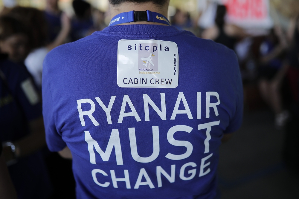 FILE PHOTO: Ryanair Airlines employees stage a protest after strike call for 24 hours demanding wage increase at the Adolfo Suarez Madrid-Barajas Airport on September 28, 2018. Burak Akbulut / Anadolu Agency