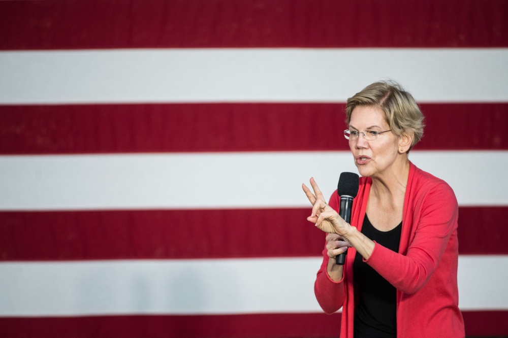 Elizabeth Warren addresses a crowd outside of the Francis Marion Performing Arts Center October 26, 2019 in Florence, South Carolina. Sean Rayford / Getty Images / AFP