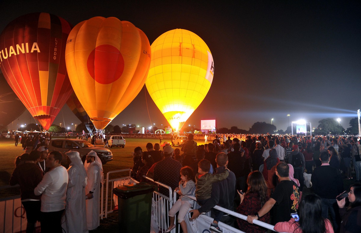 People attending the first day of Hot Air Balloon Festival at Aspire Park. Pic: Abdul Basit / The Peninsula