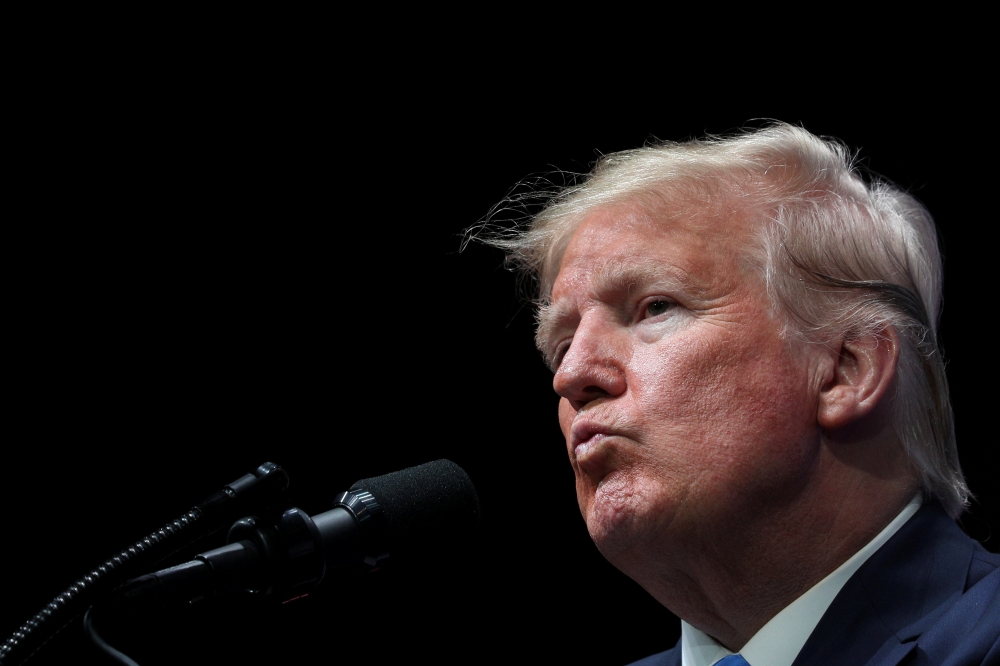 U.S. President Donald Trump delivers remarks at the Israeli American Council National Summit in Hollywood, Florida, U.S., December 7, 2019. REUTERS/Loren Elliott 