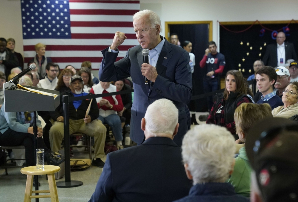 Democratic presidential candidate former U.S. Vice president Joe Biden campaigns at a VFW Hall December 7, 2019 in Oelwein, Iowa. Former Democratic presidential candidate John Kerry recently announced his endorsement of Biden with the Iowa caucuses less t
