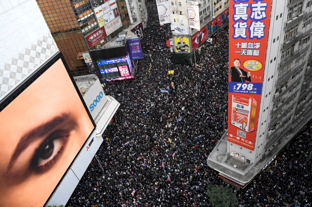 People attend a Human Rights Day march in the district of Causeway Bay in Hong Kong, China December 8, 2019. REUTERS/Laurel Chor 