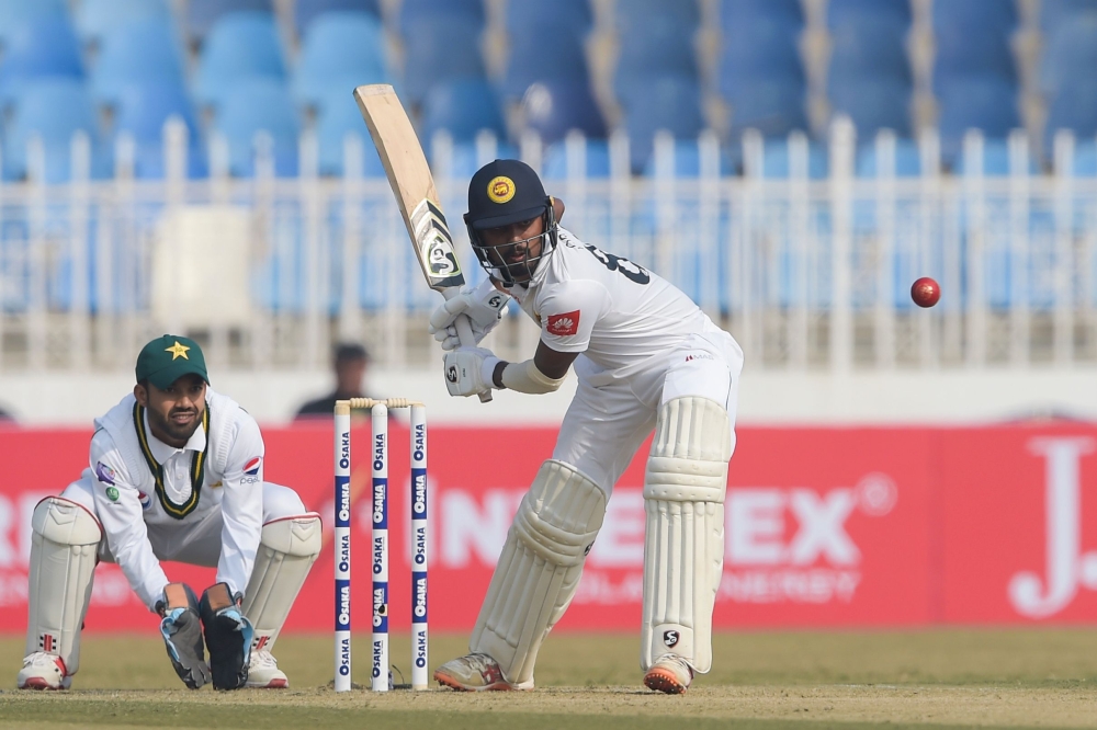 Sir Lanka's Oshada Fernando plays a shot during the first day of the first Test cricket match between Pakistan and Sri Lanka at the Pindi Cricket Stadium in Rawalpindi on December 11, 2019. / AFP / Aamir QURESHI 