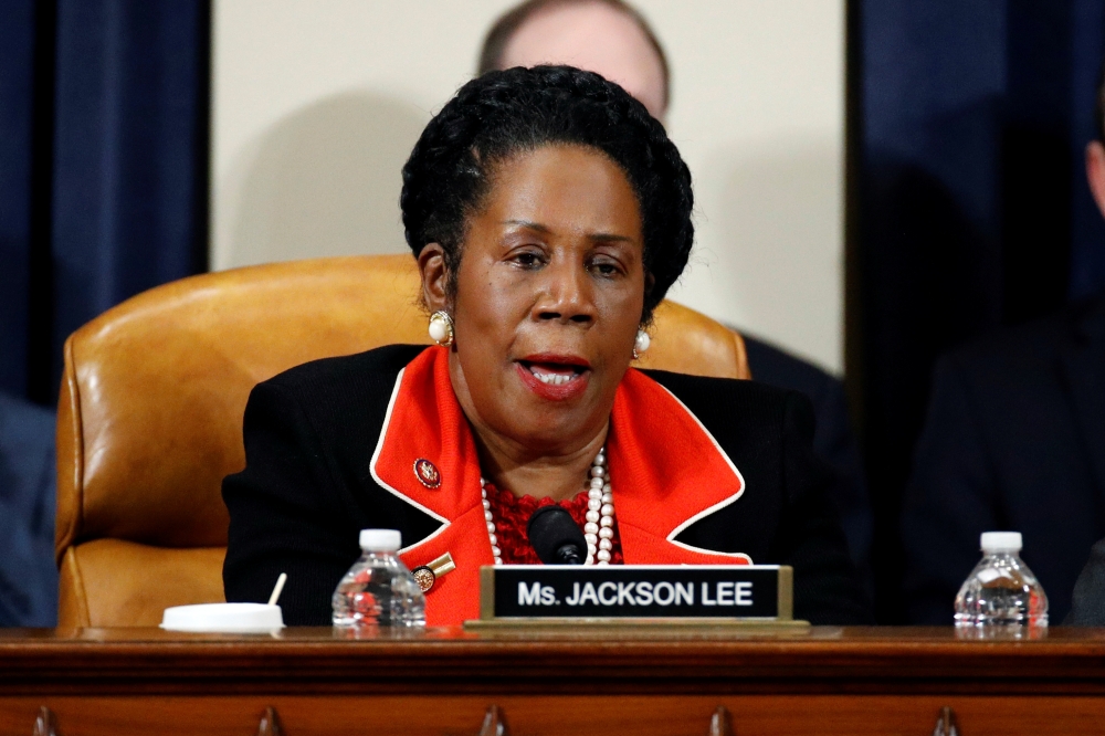 Rep. Sheila Jackson Lee, D-Texas, votes to approve the second article of impeachment against President Donald Trump during a House Judiciary Committee meeting on Capitol Hill, in Washington, U.S., December 13, 2019. Patrick Semansky/Pool via Reuters
 