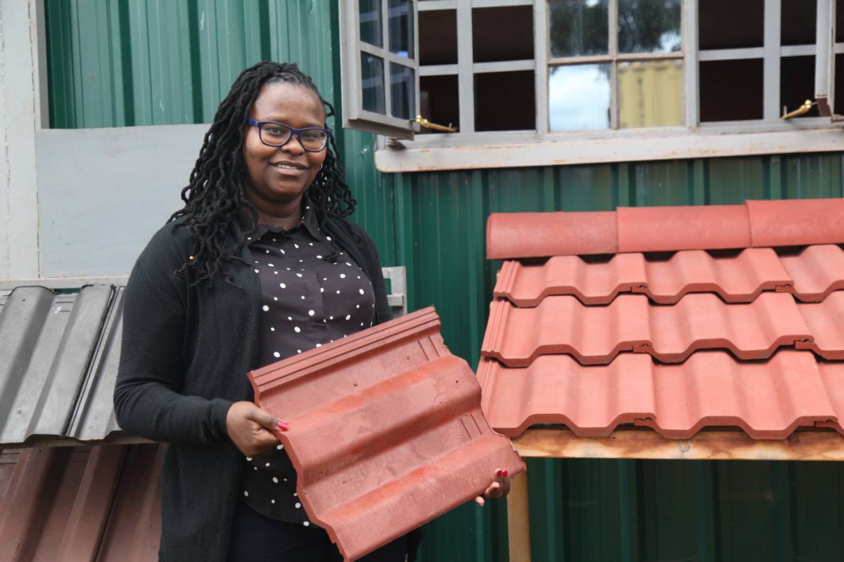 Hope Mwanake, co-founder of Eco Blocks and Tiles poses for a photo at her factory in Gilgil, Kenya on Dec 4, 2019. Thomson Reuters Foundation/Nita Bhalla