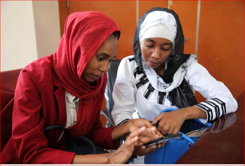 Entrepreneurs Falmata Awada and Zam-zam Djorkode give a demonstration of their mobile health app in N'Djamena, Chad, November 21, 2019. Thomson Reuters Foundation/Nellie Peyton