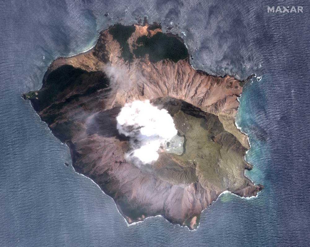 A satellite imagery of the White Island volcano, also known as Whakaari, taken on December 11, 2019 following its eruption in New Zealand. Satellite image ©2019 Maxar Technologies/via REUTERS 