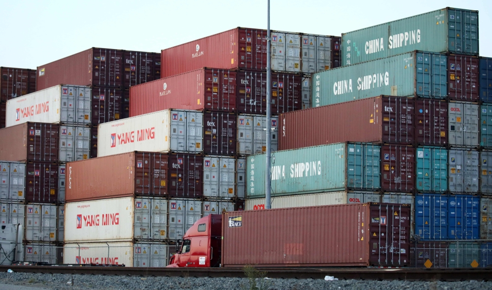 (FILES) In this file photo taken on November 06, 2019 Shipping containers, some marked 'China Shipping', are stacked at the Port of Los Angeles, the nation's busiest container port, in San Pedro, California. AFP / GETTY IMAGES NORTH AMERICA / MARIO TAMA