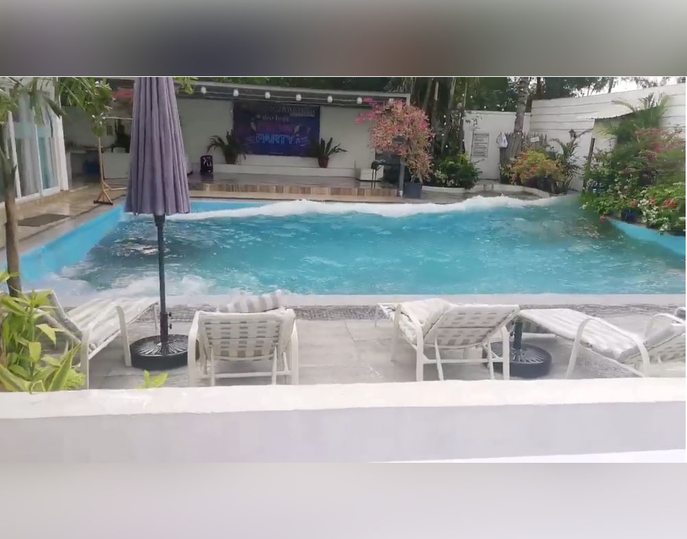 Water in hotel pool splashes during an earthquake in General Santos City, Philippines December 15, 2019, in this still image obtained from social media video. SOJARAN GERG III/via REUTERS