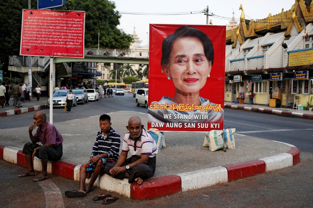 A poster supporting Aung San Suu Kyi as she attends a hearing at the International Court of Justice is seen in a road in Yangon, Myanmar, December 12, 2019. Reuters/Ann Wang