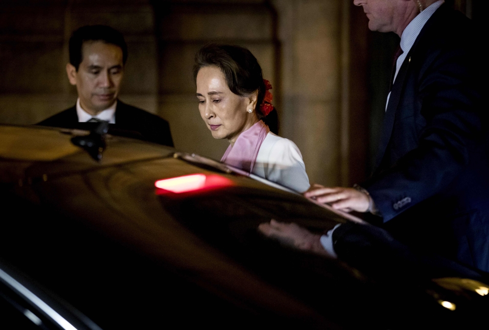 Nobel peace laureate Aung San Suu Kyi, leaves the Peace Palace in The Hague, Netherlands, on December 12, 2019. AFP / ANP / Koen Van Weel  