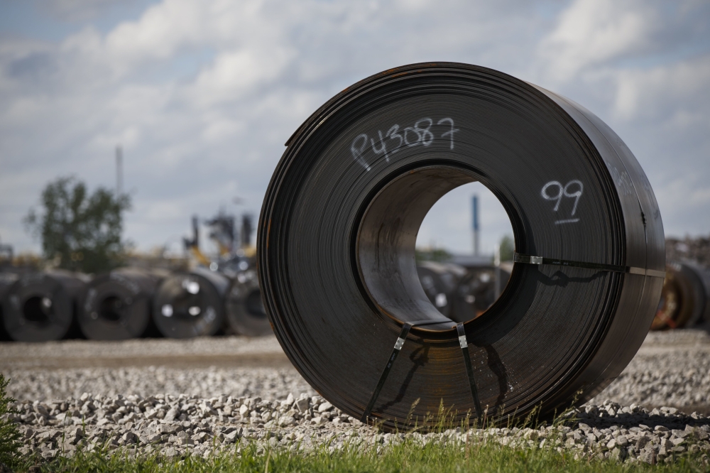 In this file photo taken on June 4, 2018 steel coils lay in a yard at ArcelorMittal Dofasco steel plant in Hamilton, Canada. AFP / Getty Images North America / Cole Burston