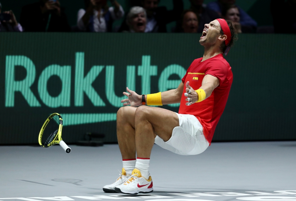 Rafael Nadal celebrates after winning his match against Denis Shapovalov of Canada and winning the Davis Cup, Madrid, Spain November 24, 2019. Reuters / Sergio Perez