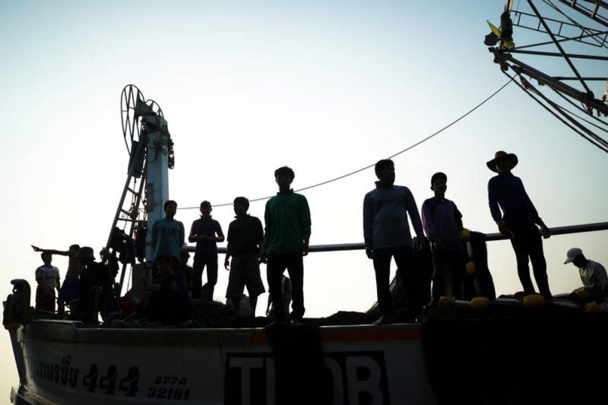 Migrant workers prepare to unload their catch at a port in Samut Sakhon province in Thailand, January 22, 2018. Reuters / Athit Perawongmetha 