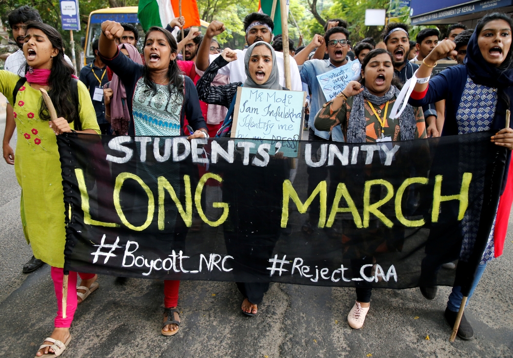 Students shout slogans during a protest march against a new citizenship law, in Kochi, India, December 18, 2019. Reuters/Sivaram V
 