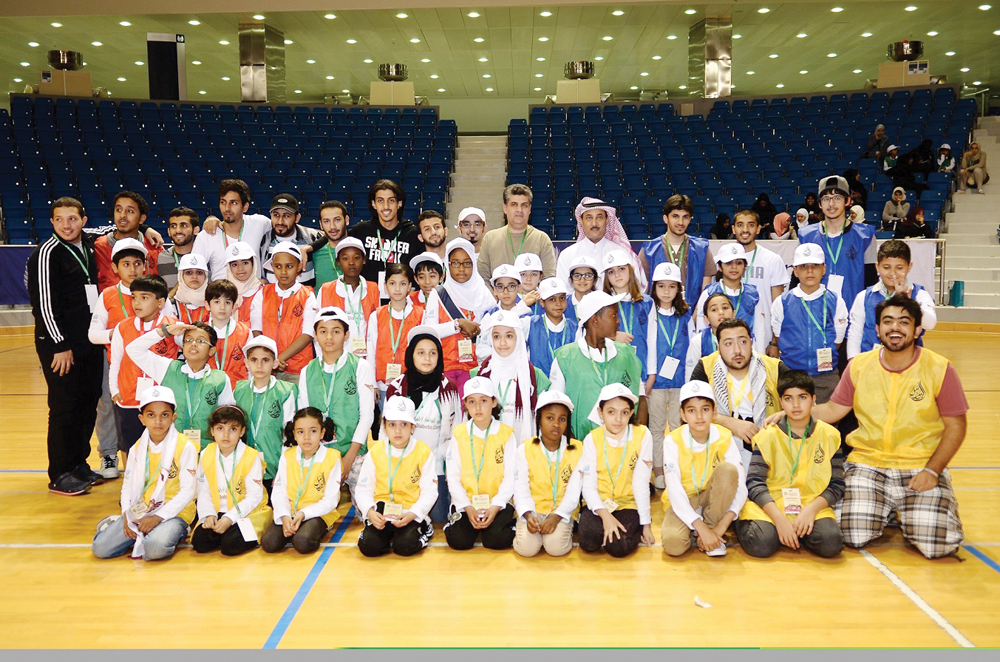 Dr Abdulla Al Hamaq, Executive Director of Qatar Diabetes Association, with Al Bawasil Camp participants.
