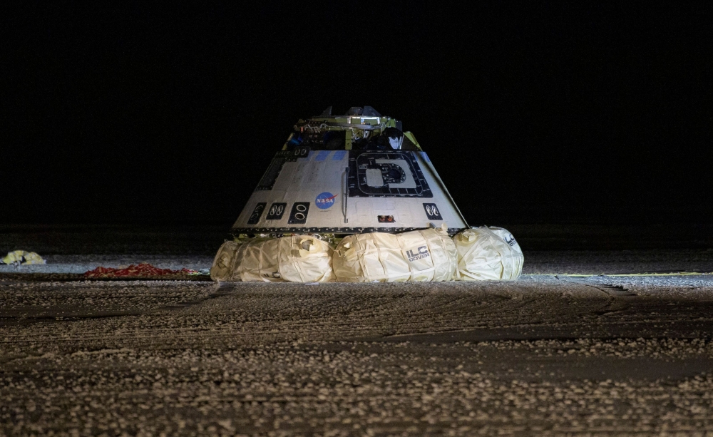 This NASA photo shows the Boeing CST-100 Starliner spacecraft after it landed in White Sands, New Mexico, on December 22, 2019. AFP / NASA / Bill Ingall
