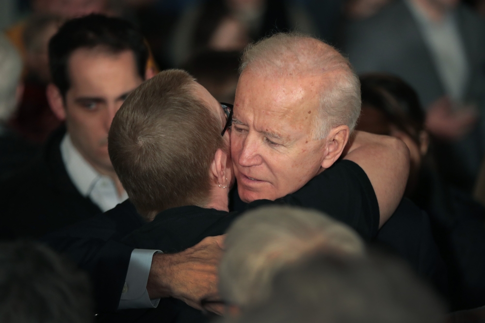 Democratic presidential candidate former vice president Joe Biden speaks to guests during a campaign stop at the Hotel Ottumwa on December 21, 2019 in Ottumwa, Iowa. Scott Olson/Getty Images/AFP