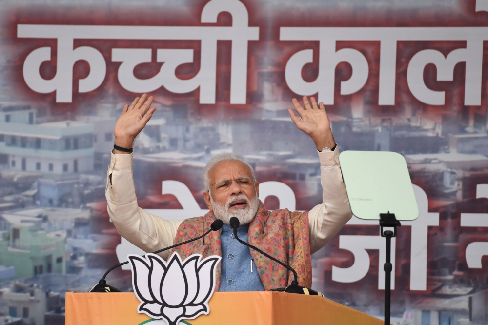 India's Prime Minister Narendra Modi speaks during a rally in New Delhi on December 22, 2019. / AFP / Prakash SINGH