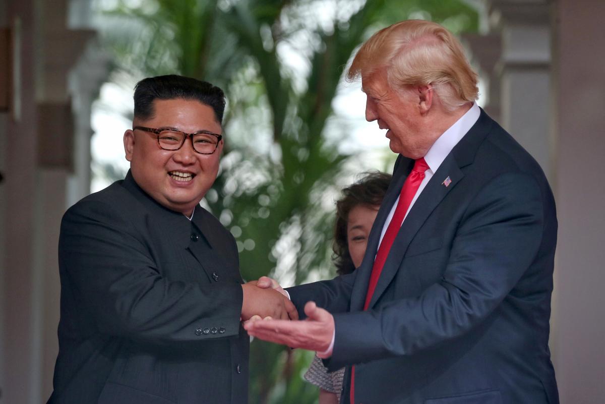 File photo of US President Donald Trump meeting North Korean leader Kim Jong Un at the Capella Hotel on Sentosa island in Singapore, June 12, 2018. Kevin Lim / The Straits Times / via Reuters