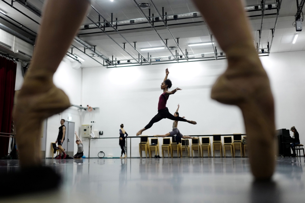 Representative image: Dancers of the Monte-Carlo ballet warm up in a room in the backstage, during a class as part of the rehearsal of the ballet show 
