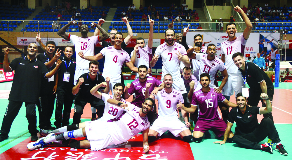 Qatari players and officials celebrate after winning their Asian Volleyball Confederation Cup semi-final match against Japan in Chinese Taipei  in this file photo.