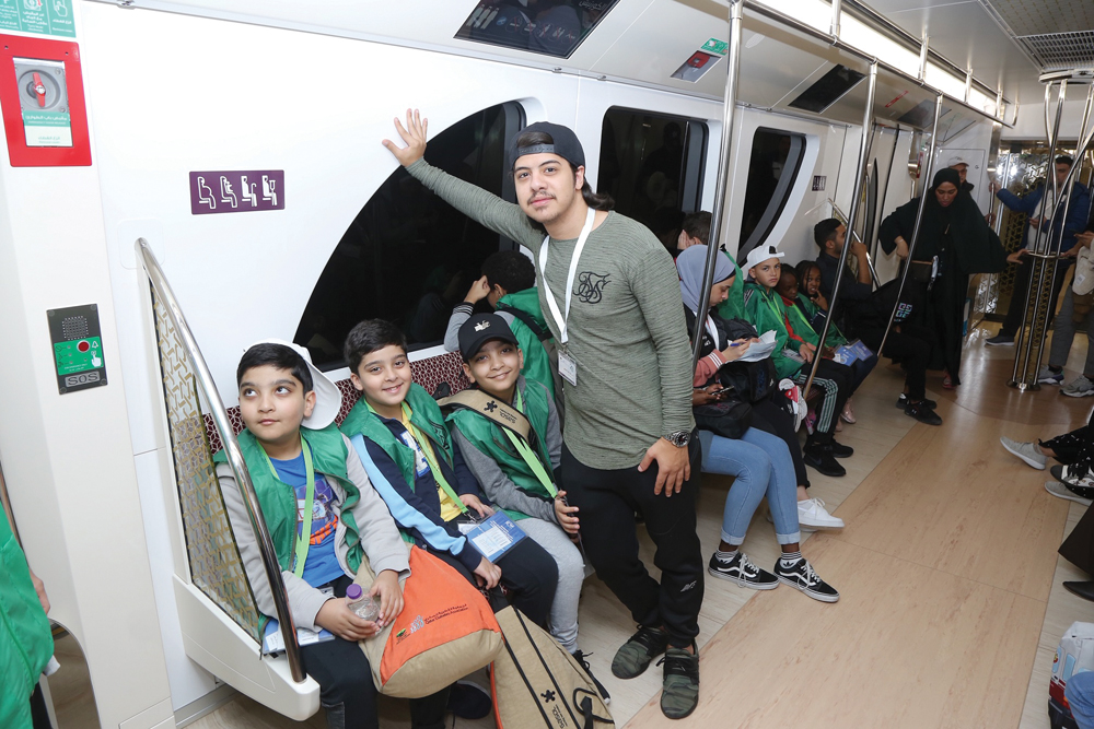 Campers experiencing a Metro ride for the first time.
