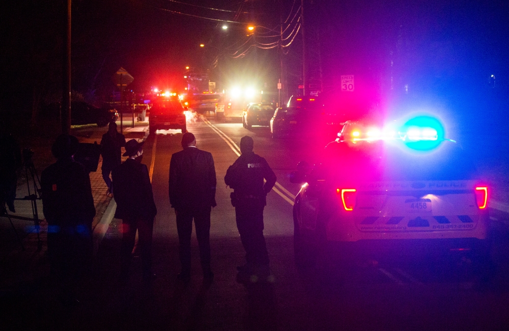 Jewish people try to reach the area where 5 people were stabbed at a Hasidic rabbi's home in Monsey, New York, U.S., December 29, 2019. REUTERS/Eduardo Munoz