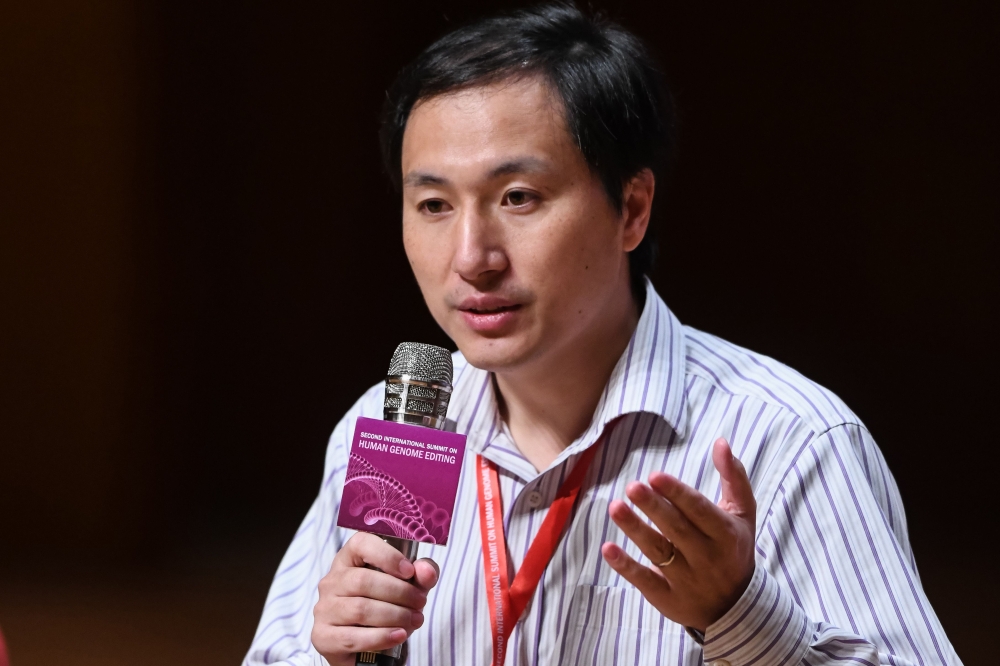  This file photo taken on November 28, 2018 shows Chinese scientist He Jiankui taking part in a question and answer session after speaking at the Second International Summit on Human Genome Editing in Hong Kong