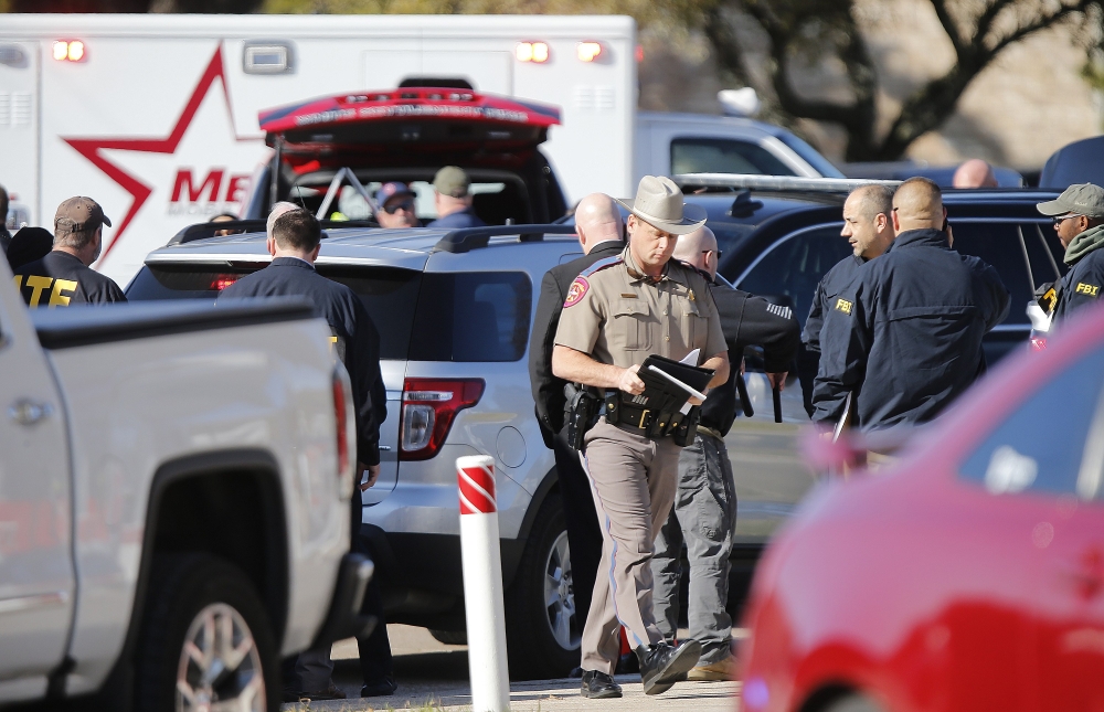 Authorities work the scene after a shooting took place during services at West Freeway Church of Christ on December 29, 2019 in White Settlement, Texas.  Stewart F House/Getty Images/AFP