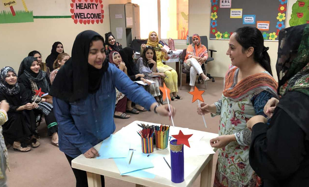 Teachers of PISQ during a training session on teaching skills development. 