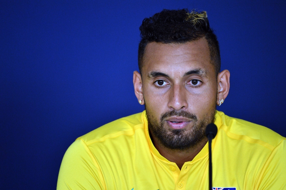 Australia's Nick Kyrgios speaks during a press conference at the Queensland Tennis Centre in Brisbane on January 2, 2020. / AFP / SAEED KHAN /
